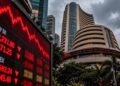 Sensex plunges 1,045 points as Indian stock market reels from oil surge and RBI rate hike